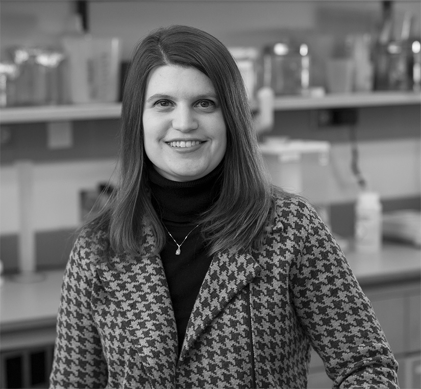 Dr. Rodino-Klapac; black and white environmental portrait photo in lab; former Nationwide Children's employee