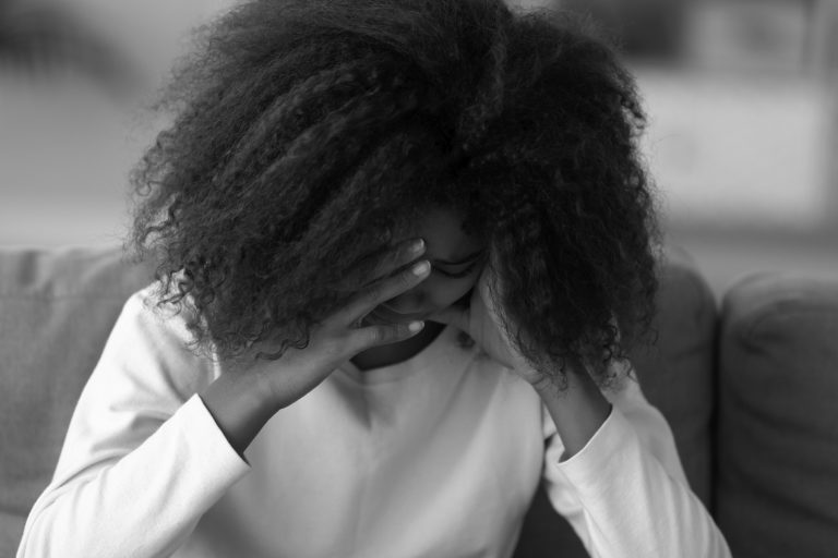 Sad black teenage girl