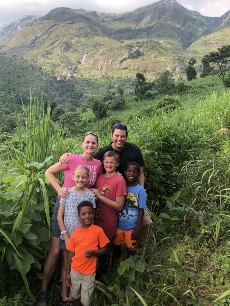 Dr. O'Brien and her family on a mountainside in Africa