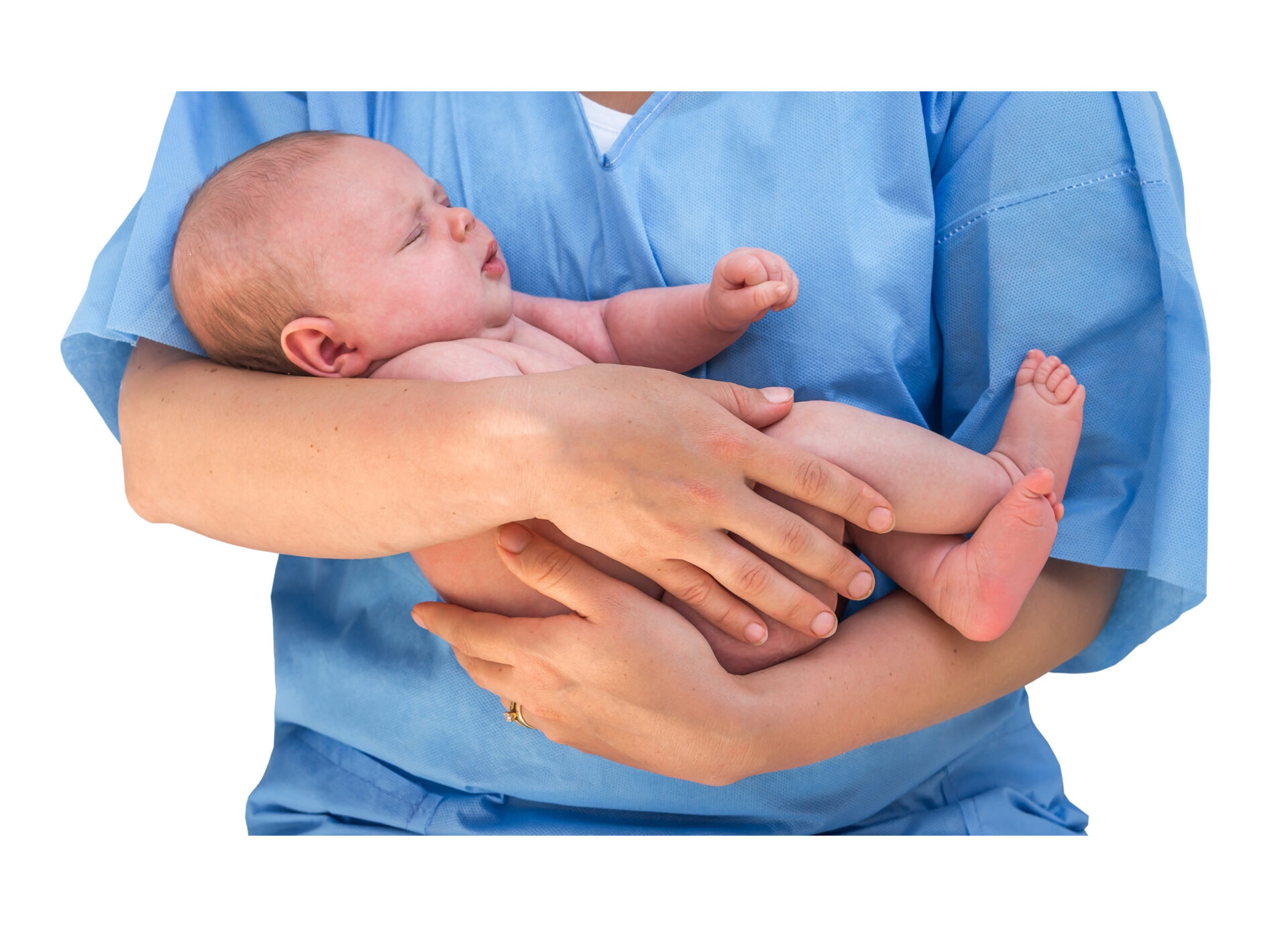 person in scrubs holding a baby