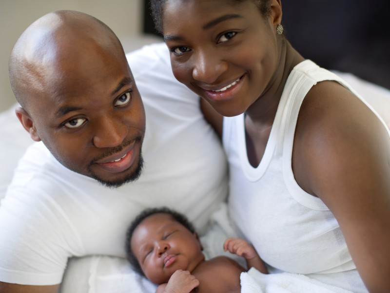 Black couple with newborn