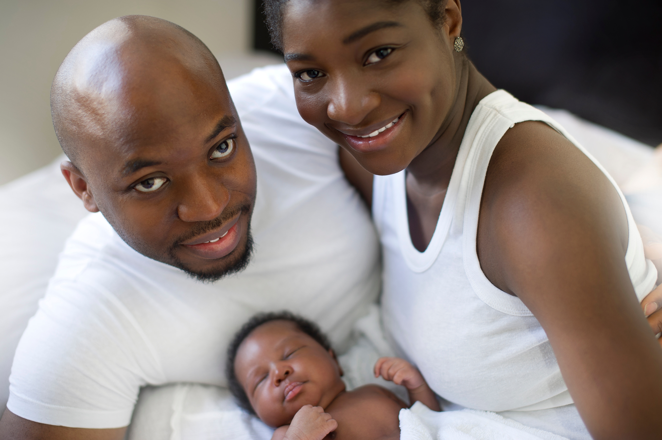 Black couple with newborn