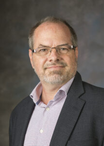 Studio portrait of Eric Nelson, PhD