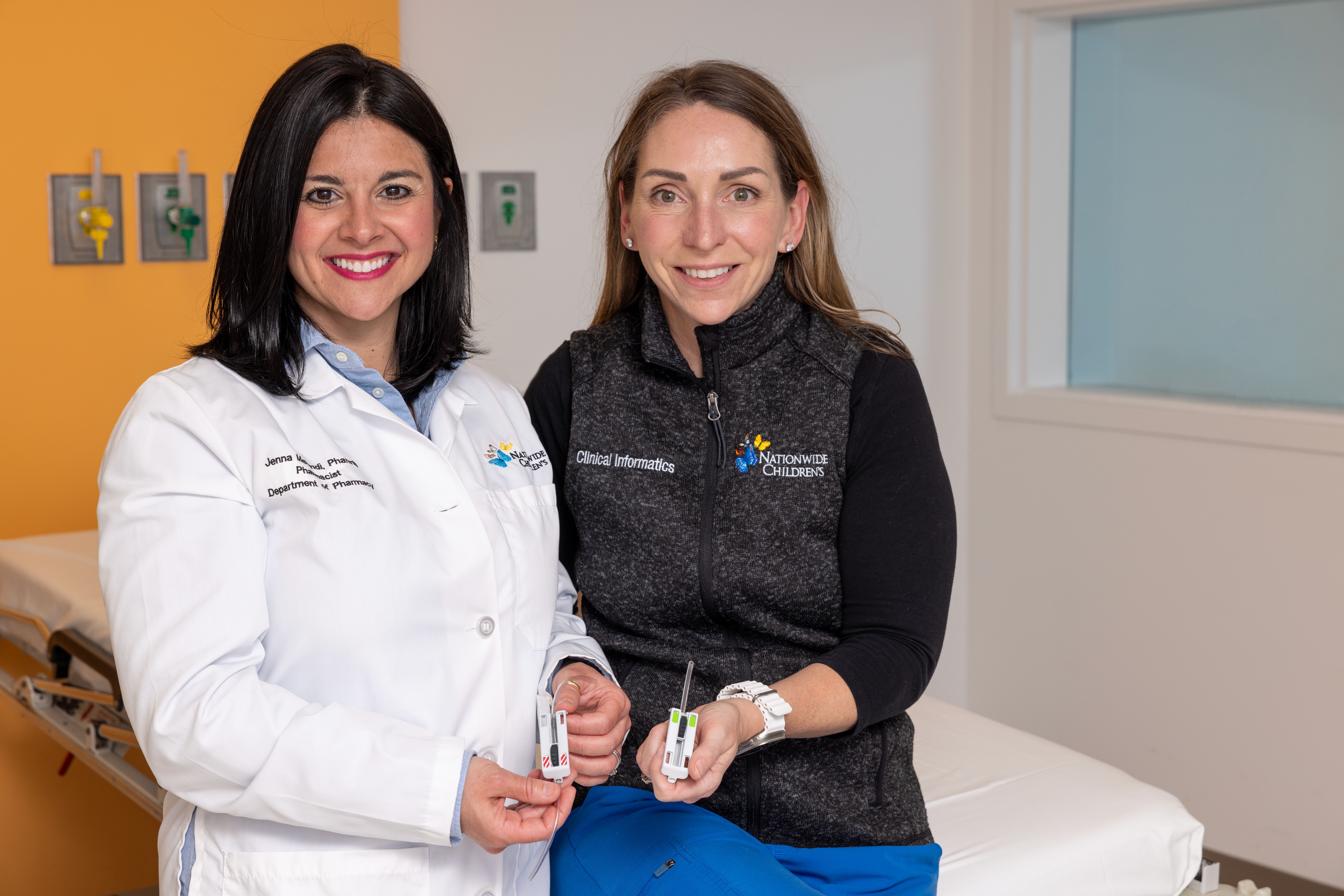 Enhanced IV line clamp inventors Jenna Merandi, PharmD, MS, CPPS (left), and Erin Aherns, BSN, RN (right), are working with the Office of Technology Commercialization at Nationwide Children's to make their invention available to others through industry partnerships.