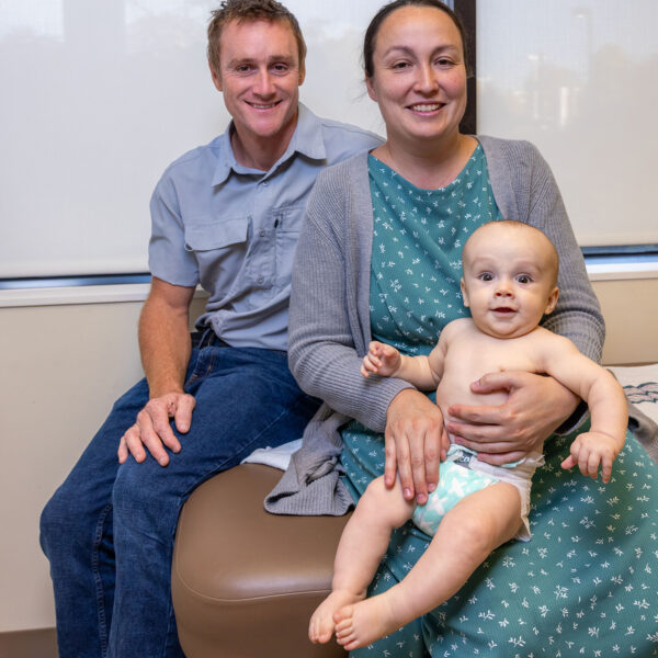 Baby Bryson with is mother and father.